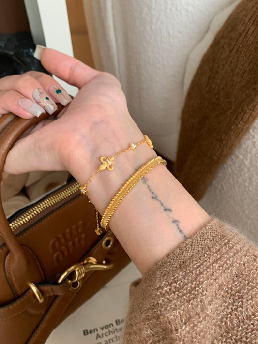 18k Vintage Iris Four-Leaf Clover Millennium Bracelet