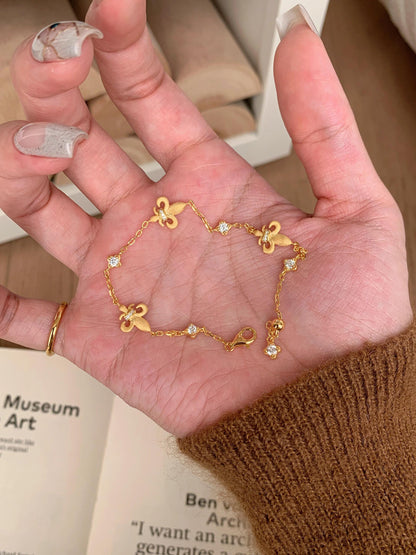 18k Vintage Iris Four-Leaf Clover Millennium Bracelet